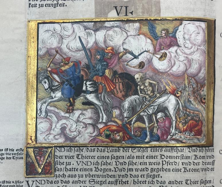 A sixteenth-century manuscript illumination showing the apocalypse with skeletal figures riding horses, monsters and angels looking on from a sea of clouds. The illumination is framed in gold on the page.