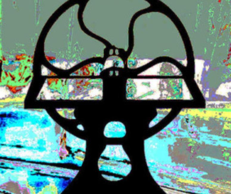 The silhouette of a printing press on a multicoloured background.